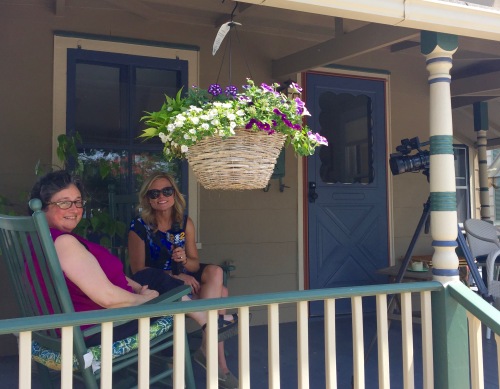 Meg Baker interviews Joyce Klein on Jersey Joyce's porch in Ocean Grove. 5/26/16. © Paul Goldfinger photo. 